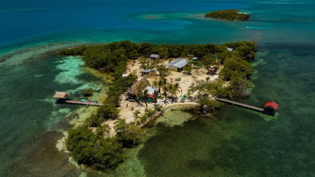 Aerial view of Hawk Caye Lodge private island in Belize